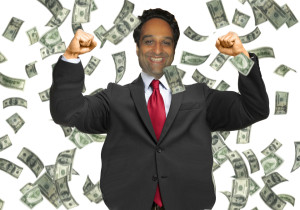 Happy man enjoying the rain of money